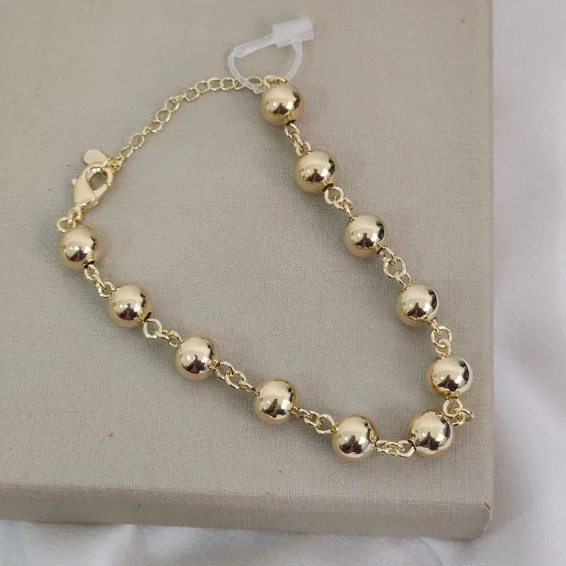 Pulseira Bolinhas Média banhada Ouro 18k