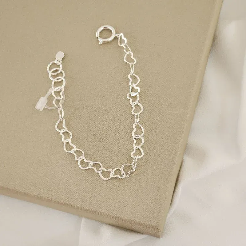 Pulseira Lisa Coração Vazado Fecho Bóia banhada Prata